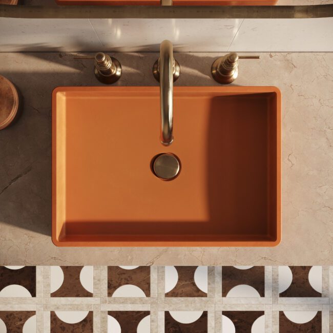 Lily Rec orange concrete vessel sink by Crete Collective, modern rectangular bathroom sink