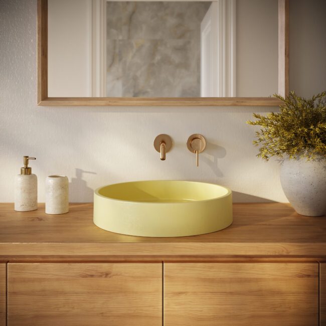 Lily Round yellow concrete vessel sink by Crete Collective, modern circular bathroom sink