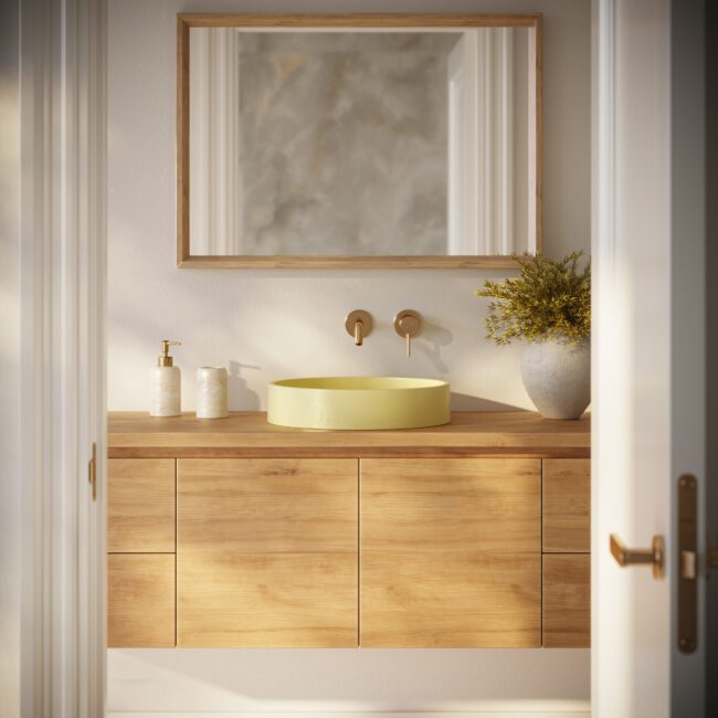 Lily Round yellow concrete vessel sink by Crete Collective, modern circular bathroom sink